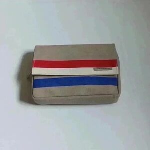 Stylish Beige Canvas Bag with Red and Blue Stripes